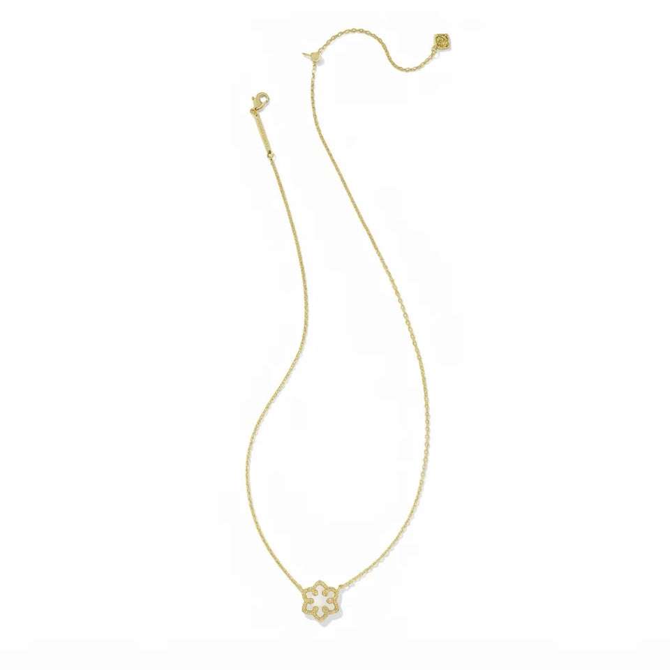 A delicate gold chain necklace featuring a small flower-shaped pendant with white inlay, displayed on a clean white background.