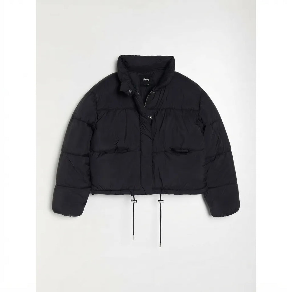 A black cropped puffer jacket with a stand-up collar, horizontal quilted baffles, and a drawstring hem, shown flat against a light gray background.