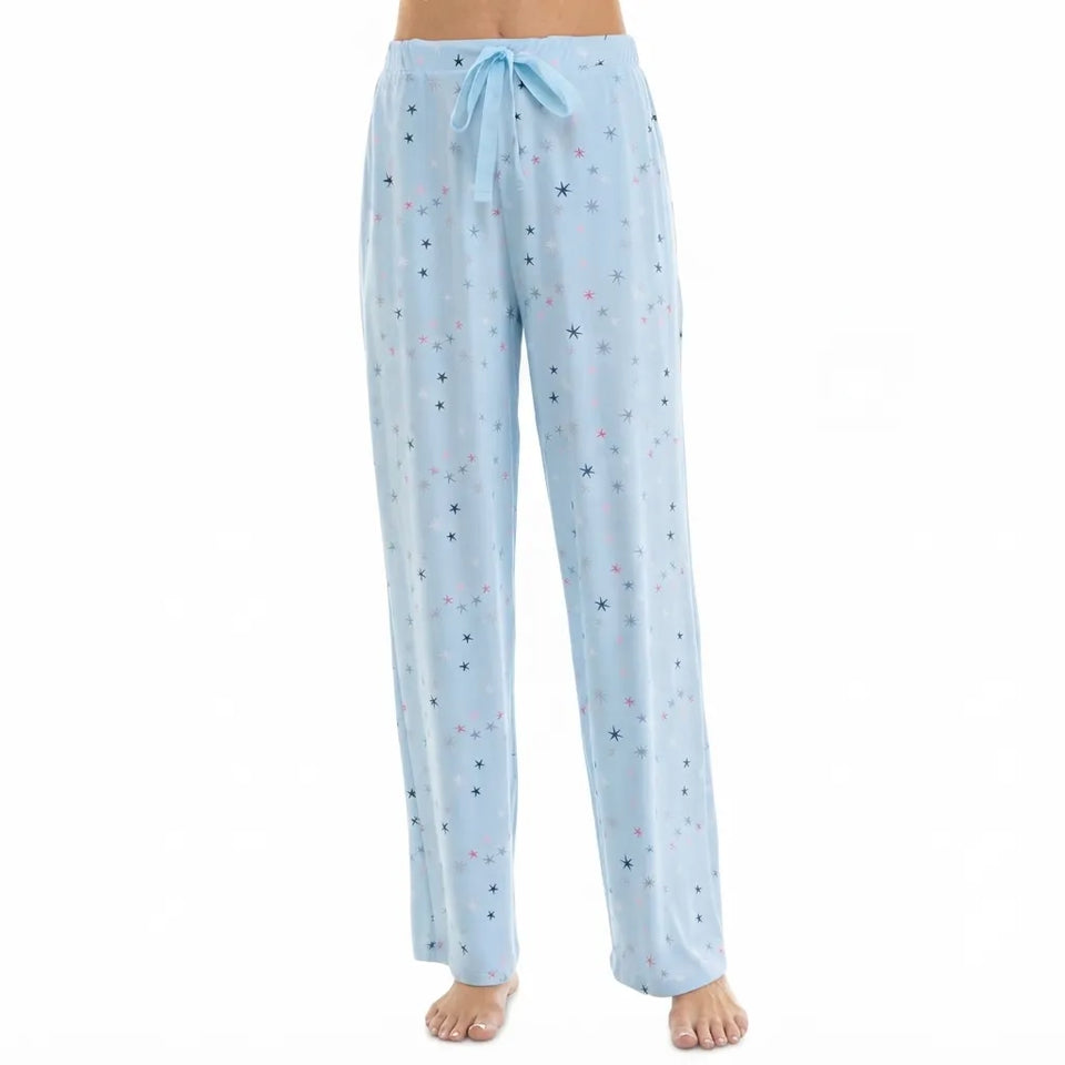 Light blue pajama pants with a star pattern, modeled on a person against a white background.