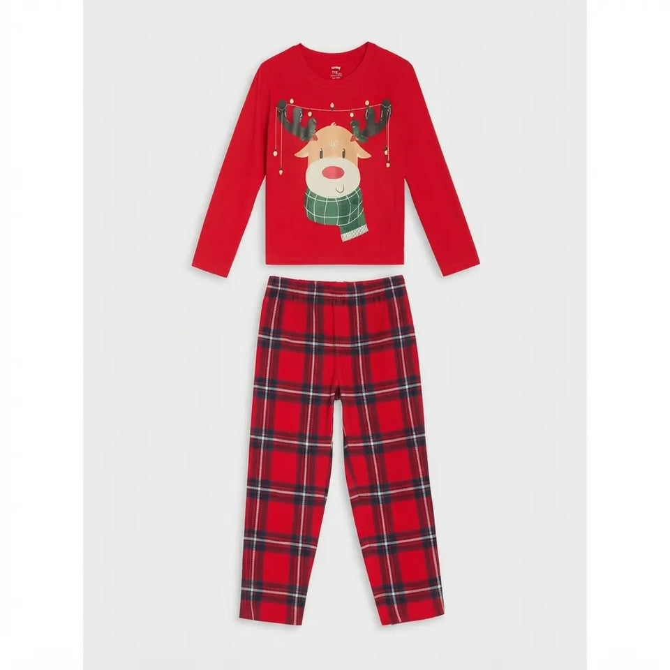 A two-piece children's holiday pajama set on a light gray background. The set includes a red long-sleeve top with a festive reindeer graphic wearing a green plaid scarf, and matching red plaid pajama pants with black and white lines.
