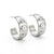 A pair of silver crescent-shaped hoop earrings decorated with three white faux pearls and three clear rhinestones on each earring, set against a plain white background.