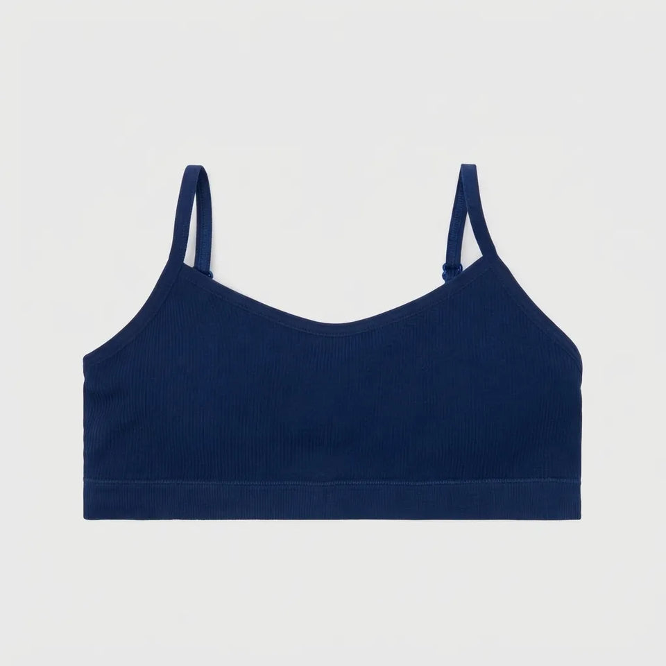 A navy blue ribbed knit sports bra with thin shoulder straps, displayed flat against a light gray background.