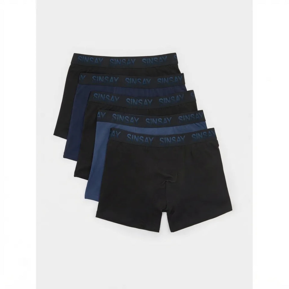 A 5-pack of Sinsay men's boxer briefs in black and navy blue, arranged in a staggered fan layout on a light gray background.