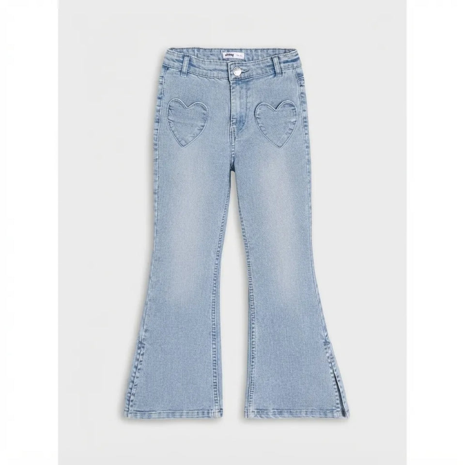 Light wash blue denim jeans with heart-shaped patch pockets and a flared bootcut silhouette, shown flat against a light gray background.