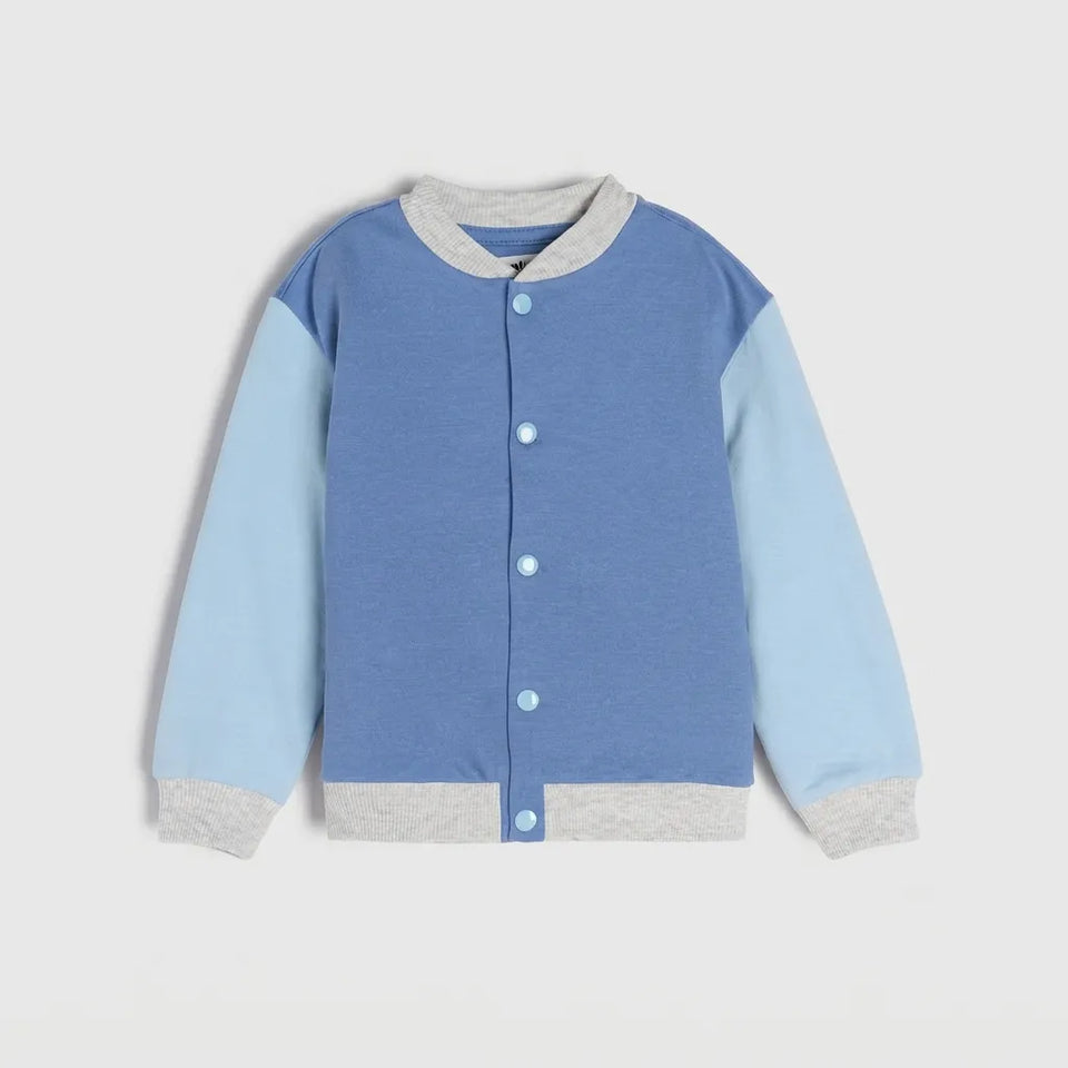 A children's long-sleeve cardigan with a heathered blue body, light blue sleeves, and gray ribbed trim on the collar, cuffs, and hem, featuring a button-up front.