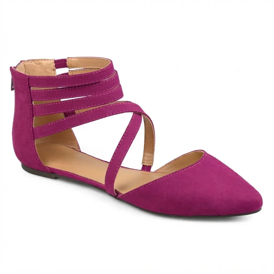 A single magenta suede flat sandal with multiple crisscrossing ankle straps and a pointed toe, shown from a side profile on a white background.