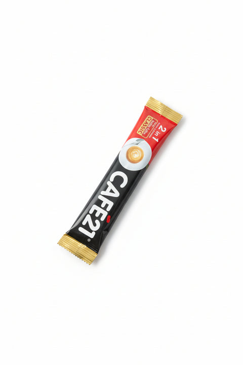 CAFE21 instant coffee stick pack on a dark surface