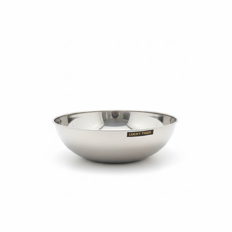 Metallic bowl with 'Lucky Tiger' label on a wooden surface
