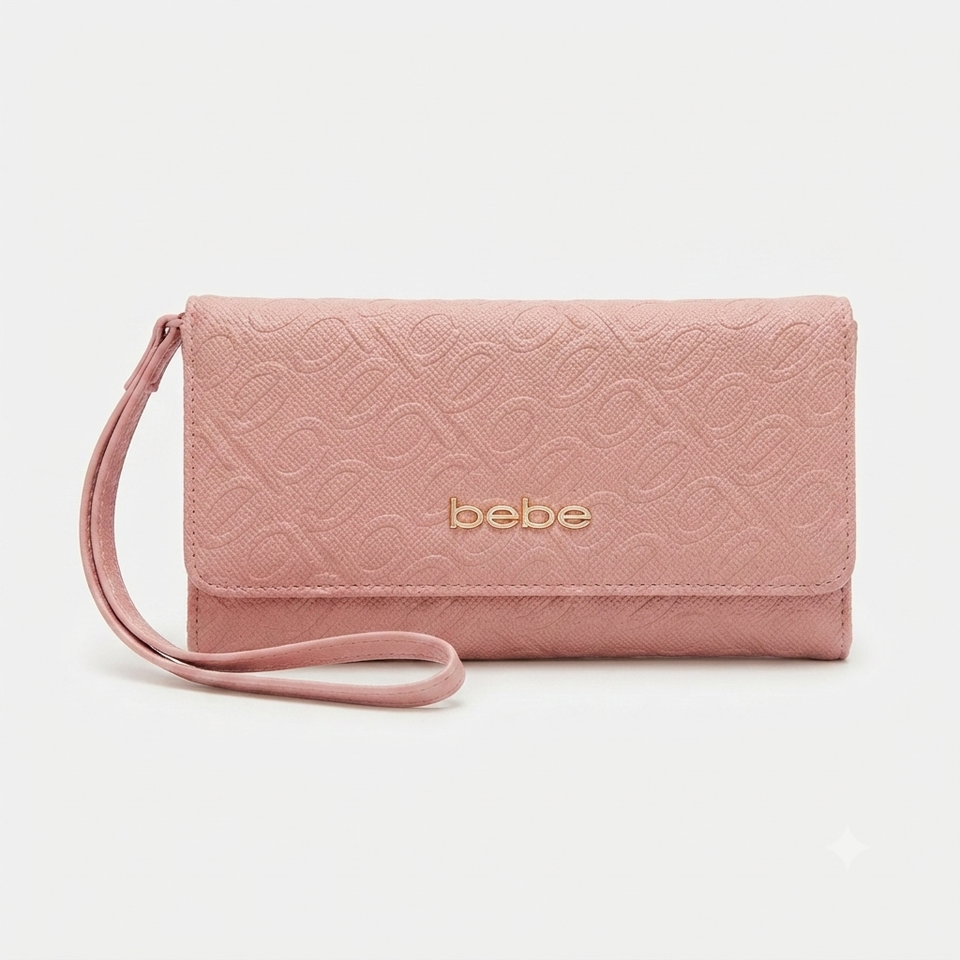 A dusty pink textured clutch bag with a matching wristlet strap and a gold-tone 'bebe' logo on the front, set against a plain light gray background.