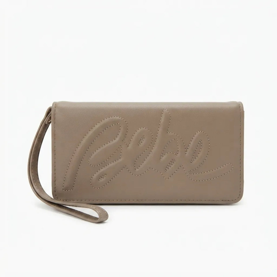A taupe leather wristlet clutch with an embossed cursive logo on the front, shown on a plain white background.