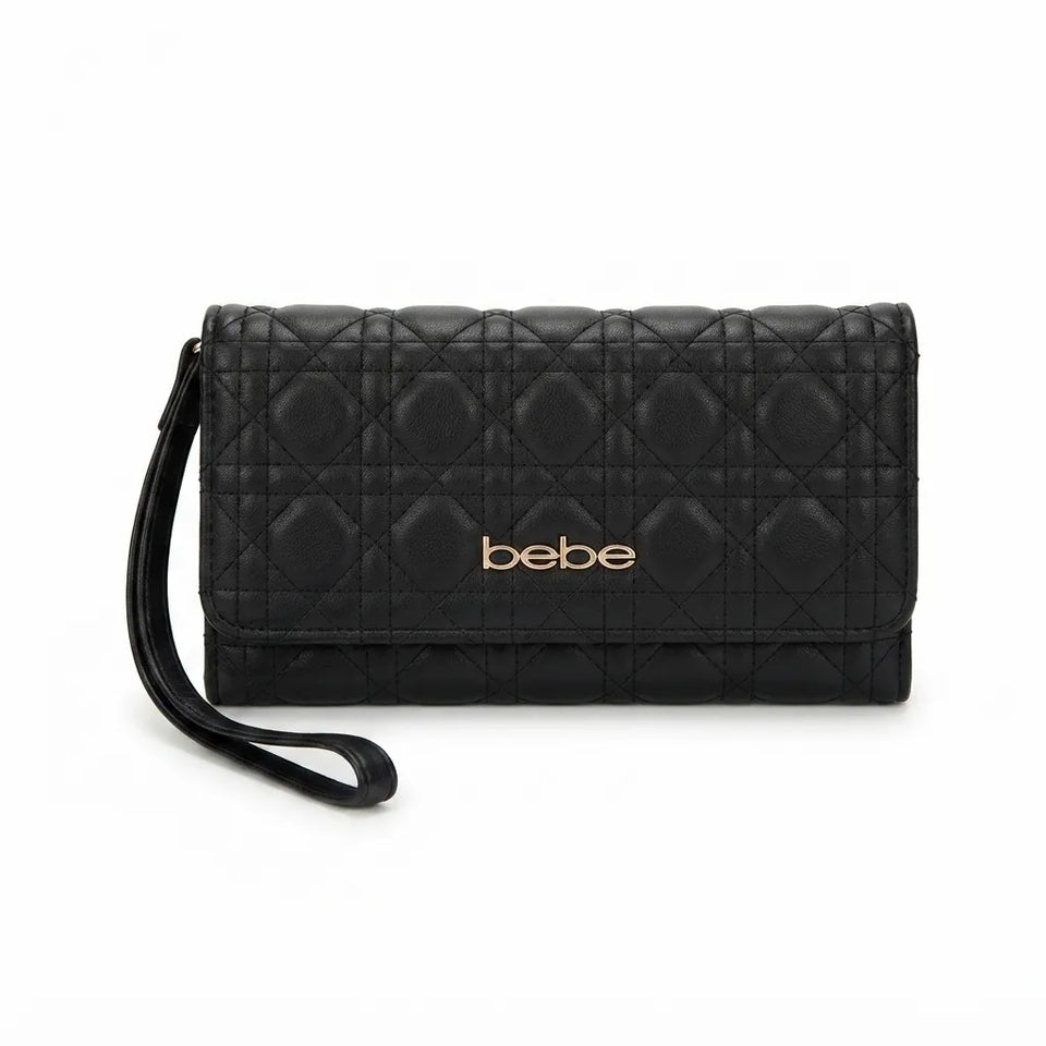 A black quilted leather clutch bag with a wristlet strap and gold-tone 'bebe' logo on the front, set against a plain white background.