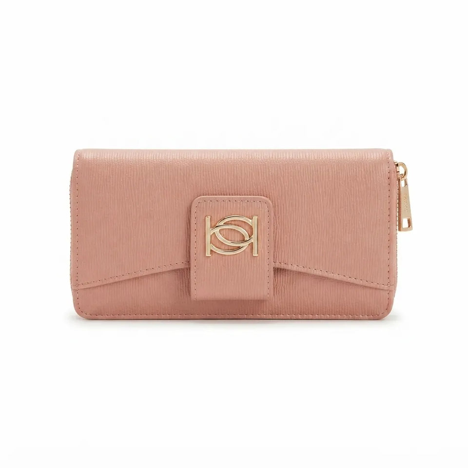 A dusty pink textured leather wallet with a gold-tone interlocking 'SH' logo on the front flap and a gold zipper pull on the right side, shown against a plain white background.