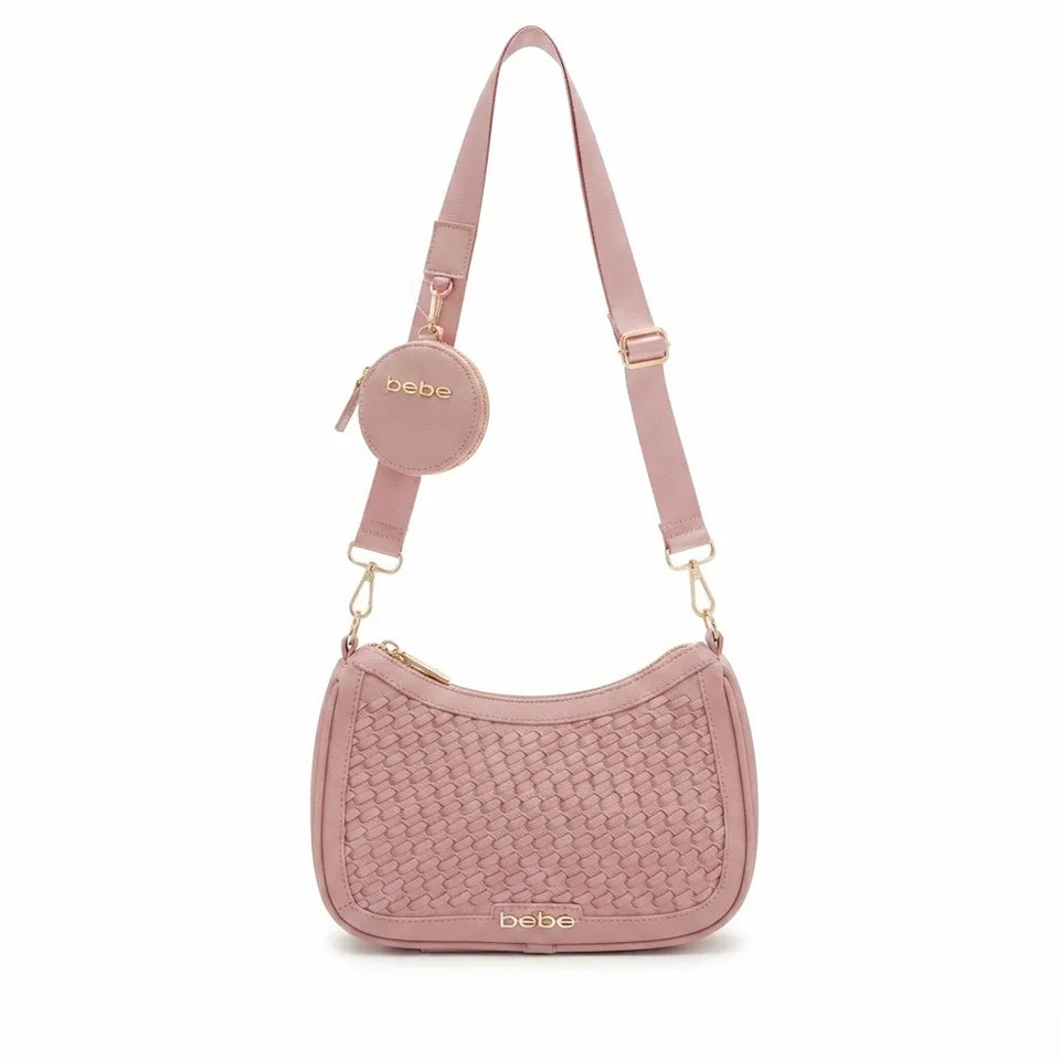 A dusty pink woven leather shoulder bag with a matching round zippered pouch and adjustable shoulder strap, featuring gold-tone hardware and the 'bebo' brand name on the front.