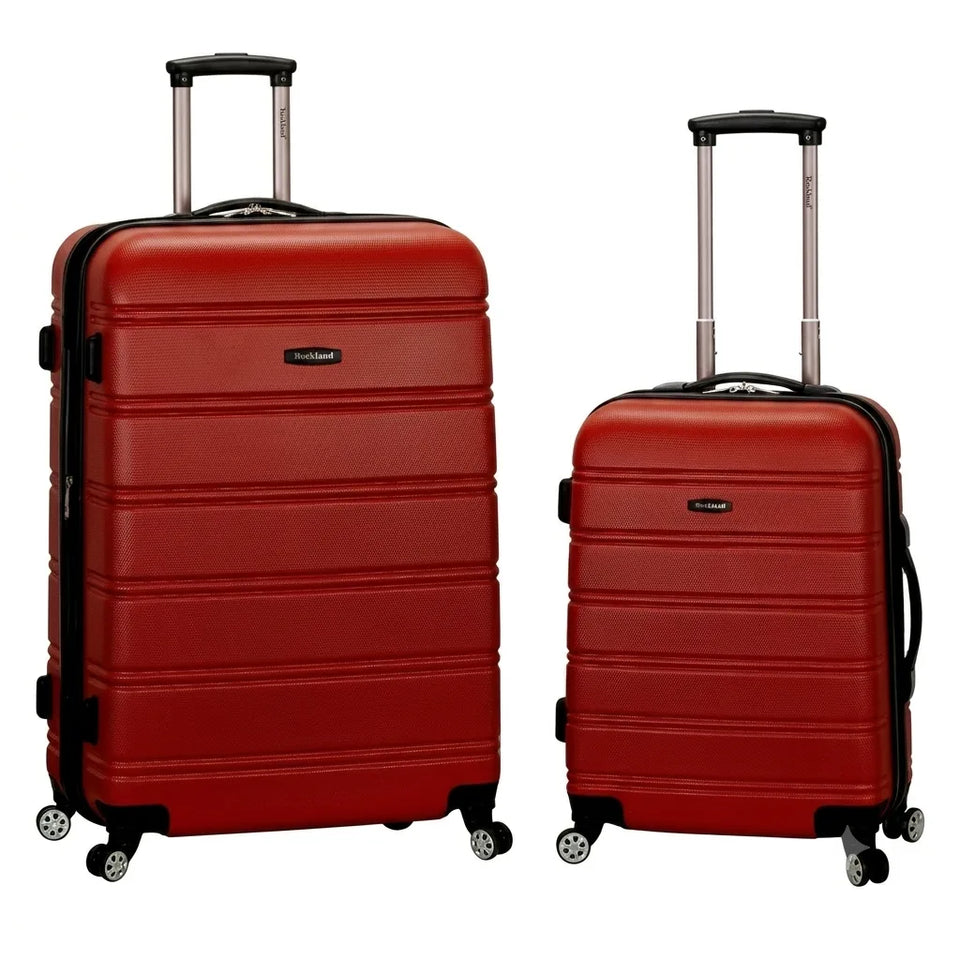 Two red hardshell spinner suitcases, one larger and one smaller, shown on a plain white background with their telescoping handles extended.