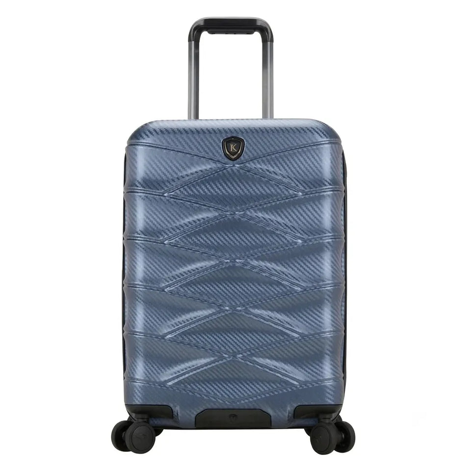 A blue textured hard-shell suitcase with a quilted diamond pattern, black telescoping handle, and four spinner wheels, shown on a plain white background.