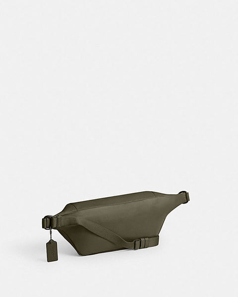 Green waist bag on a light gray background