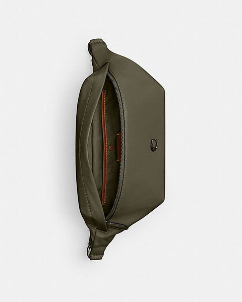 Green sling bag on a white background