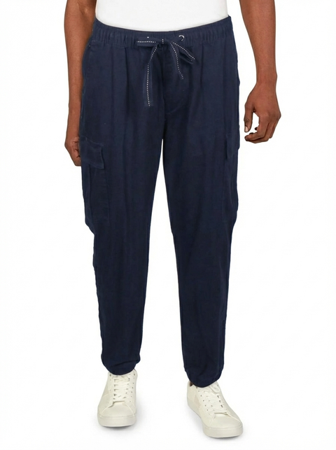 Navy cargo pants worn by a person on a white background
