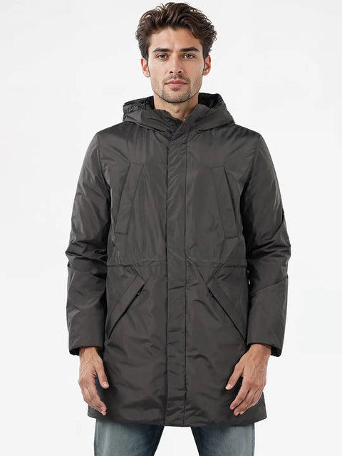 Man wearing a dark gray hooded jacket on a white background