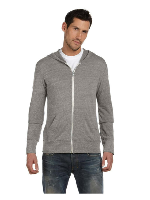 Man wearing a gray zip-up hoodie on a white background