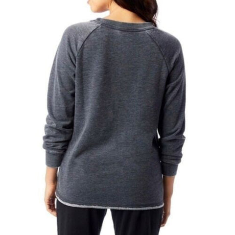 Gray long-sleeve shirt worn by a person on a white background