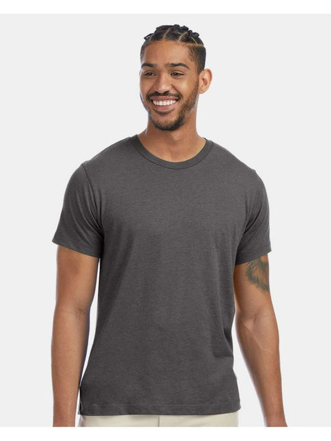 Man wearing a dark gray t-shirt against a white background