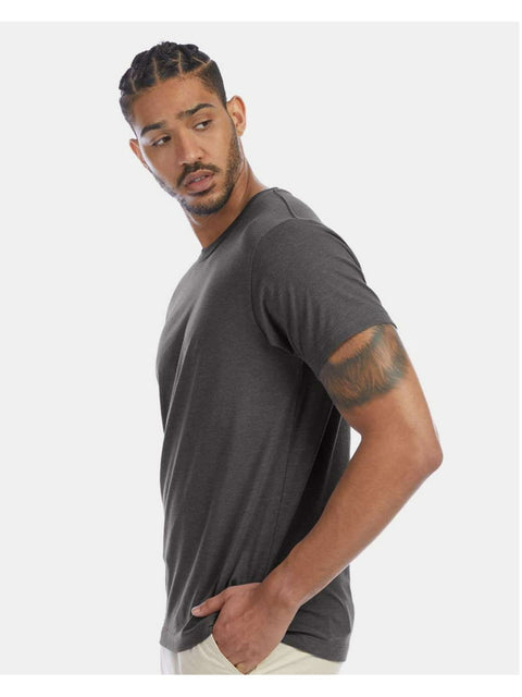 Man wearing a gray t-shirt on a white background