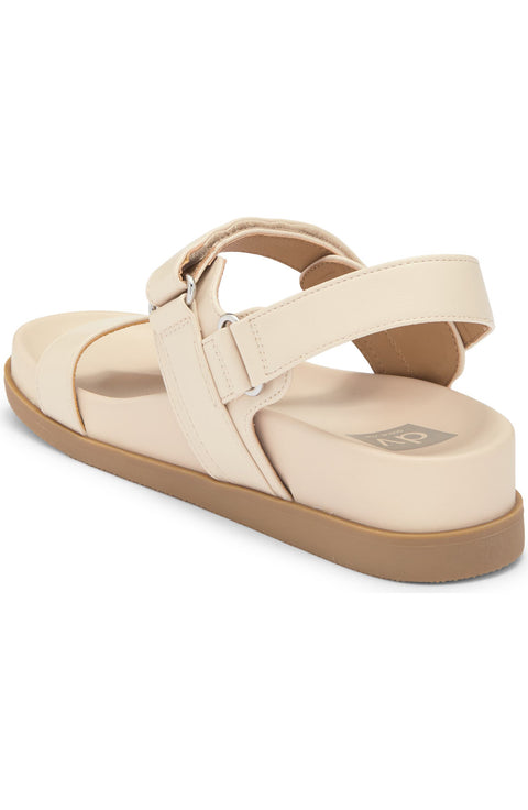 Beige sandal with a brown sole on a white background