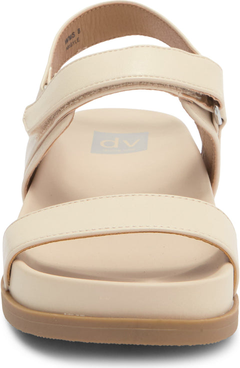 Beige sandal with a visible brand logo on a white background