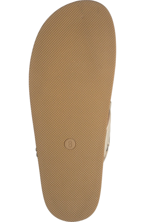 Close-up of a beige sandal sole on a white background