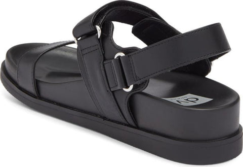 Black sandal with a strap on a white background