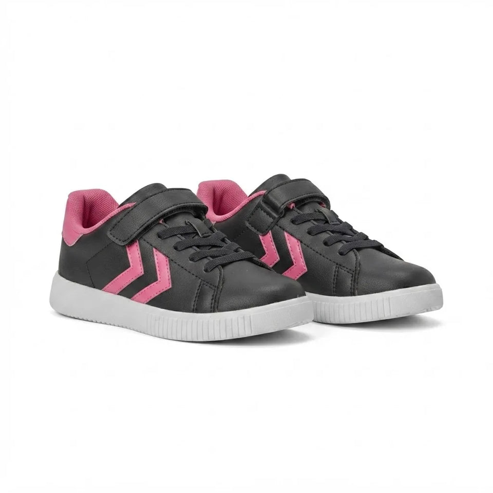 A pair of black children's sneakers with bright pink accents, including the chevron logo on the side, the lining of the collar, and the hook-and-loop strap interiors, set against a plain white background.