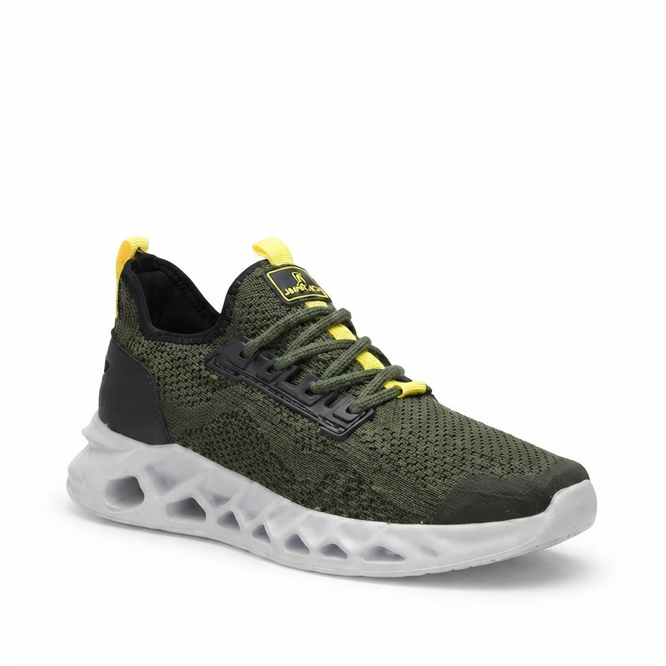 A single athletic sneaker shown from a three-quarters angle on a white background. The shoe features an olive green mesh upper, black laces, a black heel counter, and bright yellow accents on the tongue label and heel pull tabs.