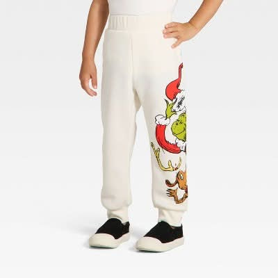 The Grinch Boy's Off White Printed Fleece Sweatpants | The Grinch In Lebanon