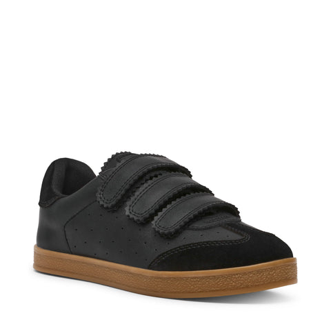 Black children's sneaker with velcro straps on a white background
