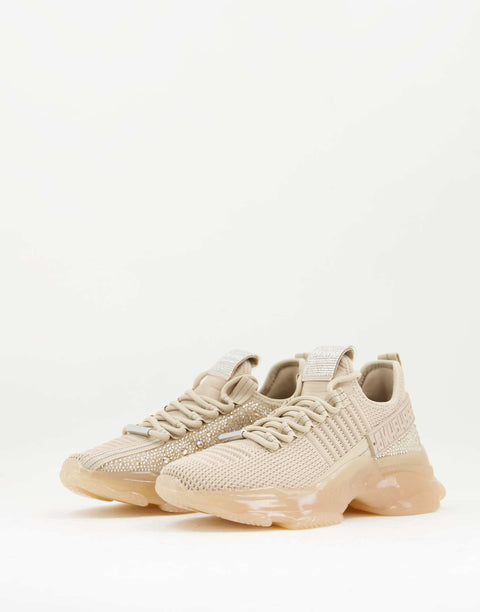 Beige sneakers on a light beige background