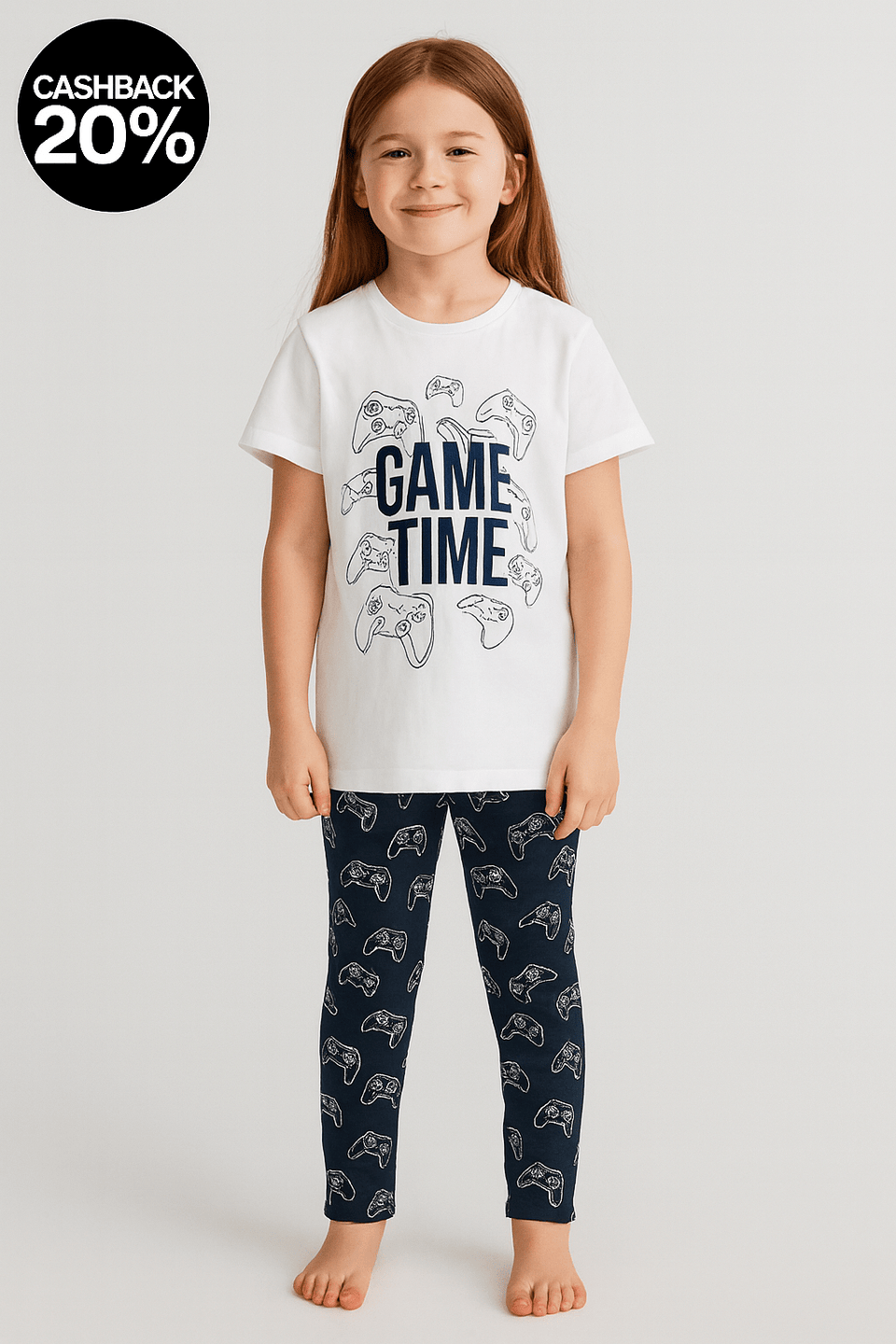Child wearing a 'Game Time' t-shirt and dark pants with gaming controller patterns on a light gray background.