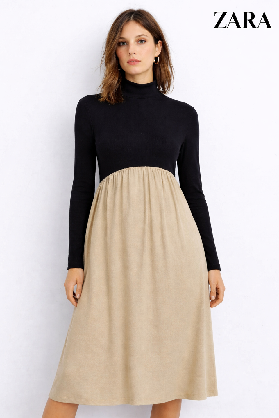 Woman wearing a black turtleneck and beige skirt with Zara branding.