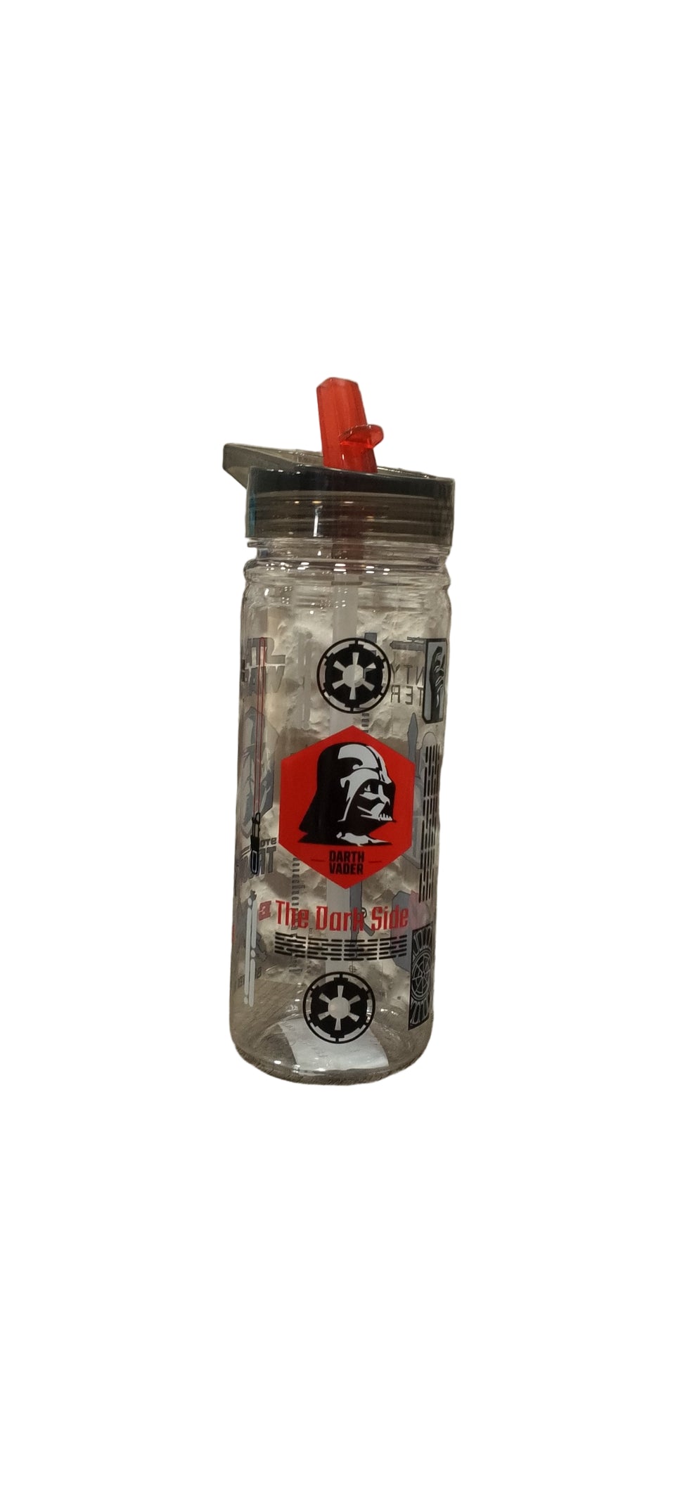 Clear water bottle with red cap and black and white design on a textured wall background