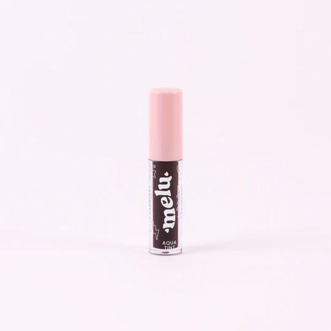 Lip balm with pink cap and black label on a white background