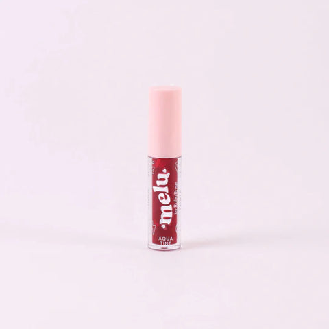 Lip tint with pink cap and red label on a white background