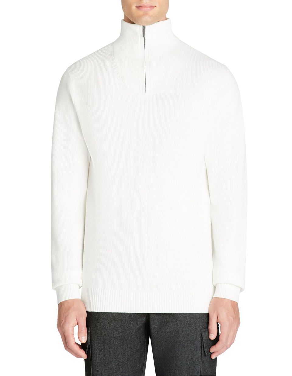 White quarter-zip sweater worn by a person on a white background