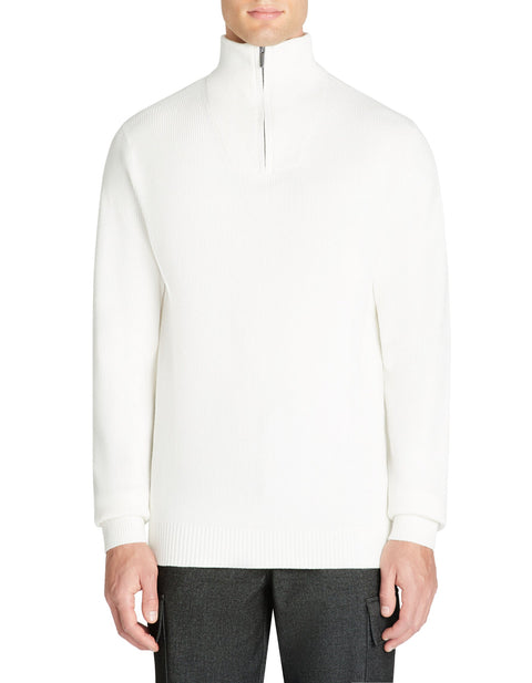 White quarter-zip sweater worn by a person on a white background