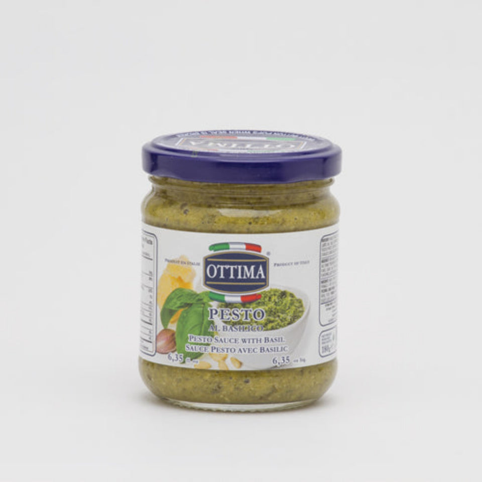 A jar of Ottima Pesto Sauce with Basil 180g, showing the product label with its name and description.