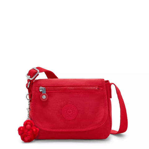 Red handbag with a floral charm on a white background