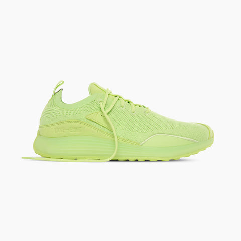 Neon green sneaker on a white background