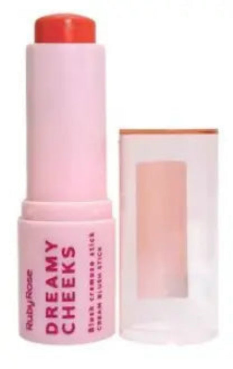 Pink blush stick with applicator on a white background