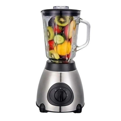 Blender with a clear container filled with fruits on a white background