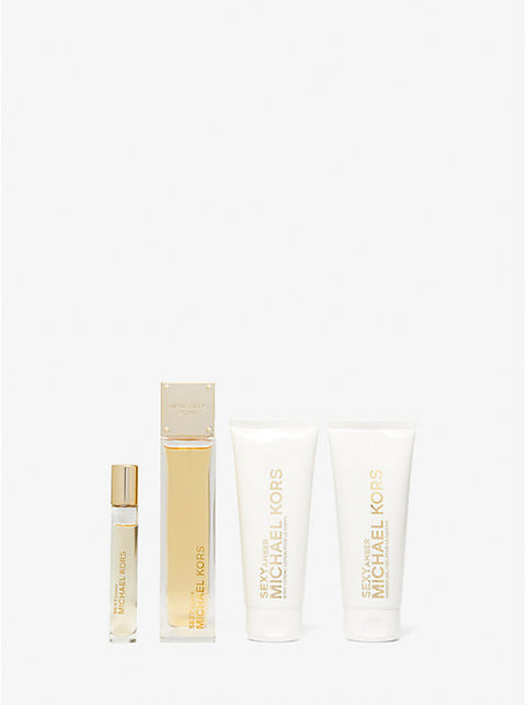 Michael Kors perfume set on a white background