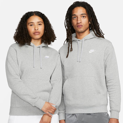 Two people wearing gray Nike hoodies and shorts on a white background